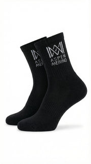 Two black socks with 'Aspen Merino' branding on a white background